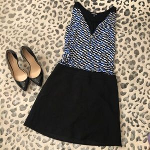 Express zipper sleeveless shirt.